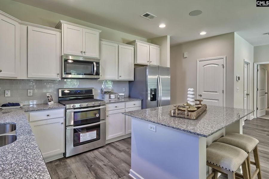 Furnished interior view inside a new home in Cottages at Roofs Pond, West Columbia (Image 3).