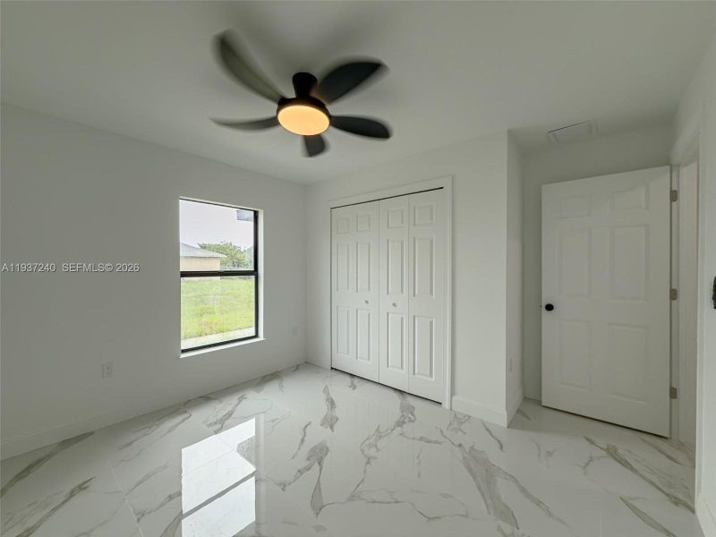 Spacious, unfurnished interior of a new home in , Lehigh Acres (Image 34).