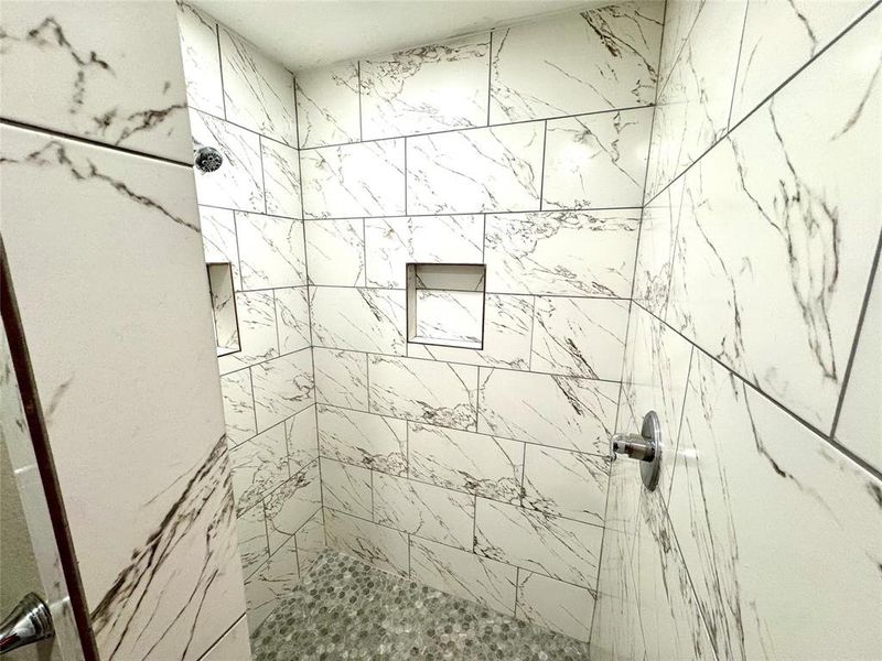 Bathroom with a stall shower
