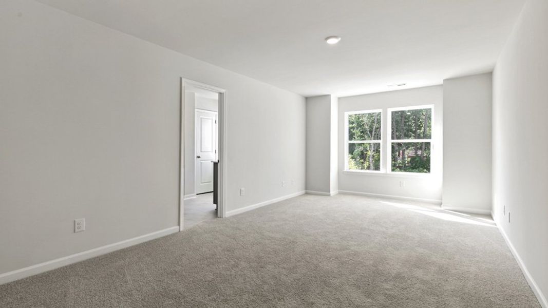 Representative unfurnished interior of a home built from the LANSING - TRADITIONS by D.R. Horton in Chapel Townes, Raleigh (Image 15).