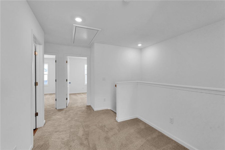 Bright and inviting, this area features plush carp Bright and inviting, this area features plush carp