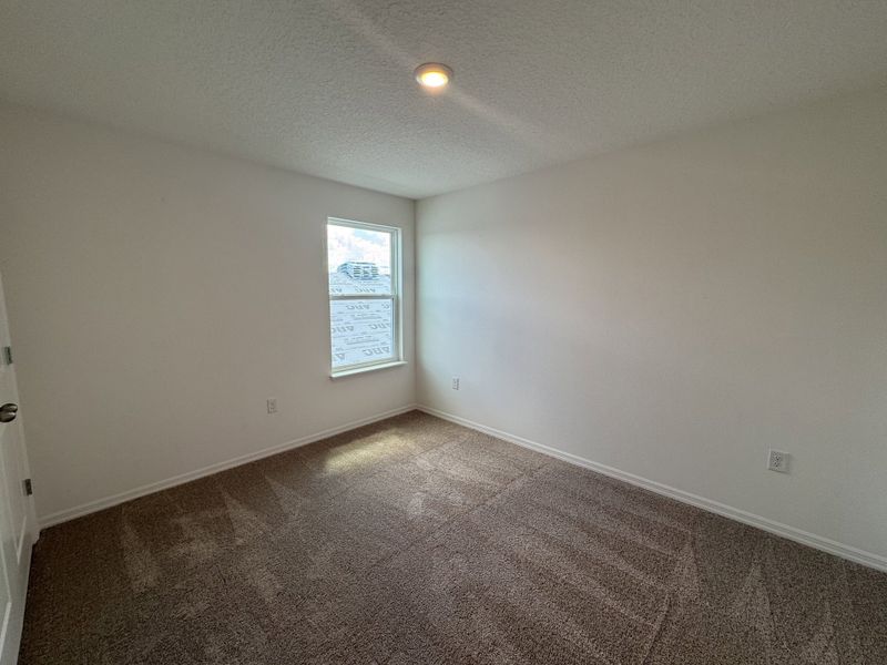 Spacious, unfurnished interior of a new home in Lake Deer Estates, Poinciana (Image 16).