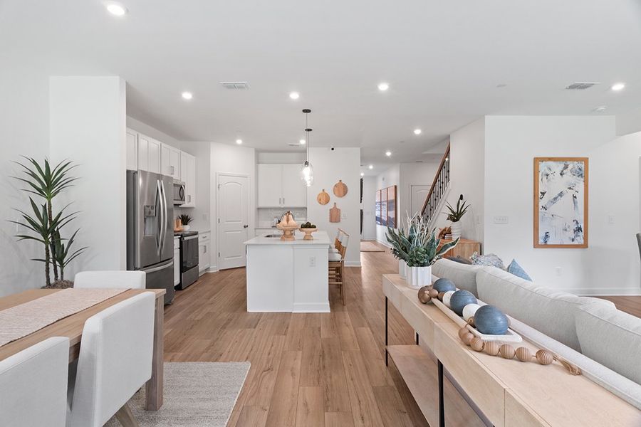 A living room with a couch and a table.