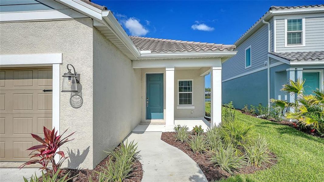 Exterior details and patio area of a home in Grand Park, Sarasota (Image 2).