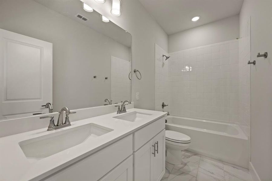 Guests will enjoy their own space in this lovely guest bath! Guests will enjoy their own space in this lovely guest bath!