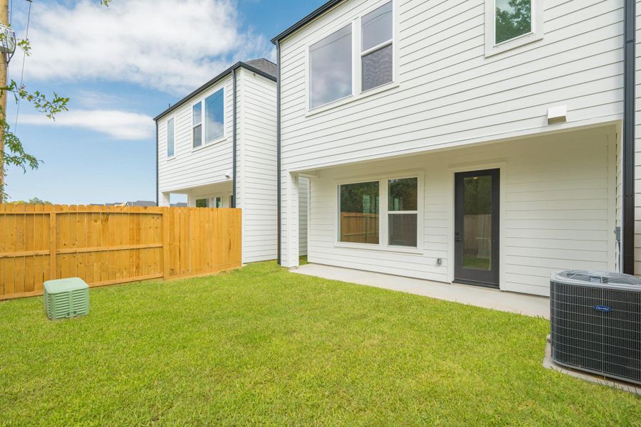 Exterior details and patio area of a home in , Houston (Image 1). Exterior details and patio area of a home in , Houston (Image 1).