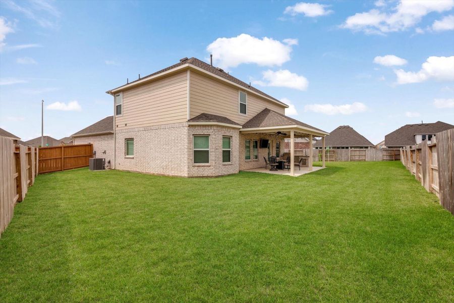 Front exterior of a new home in Marvida, Cypress, TX, highlighting curb appeal (Image 2).