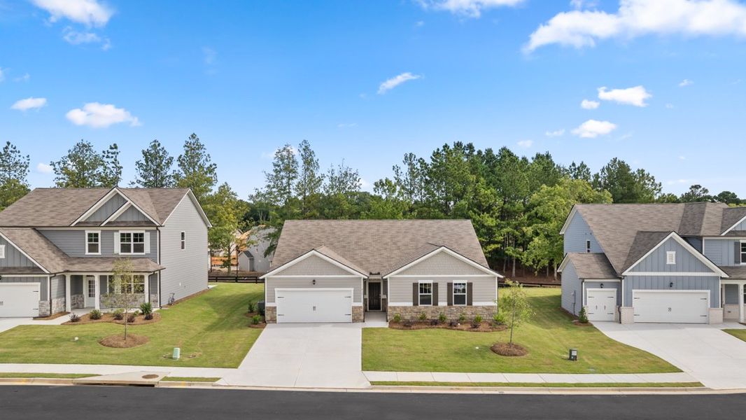Representative exterior photo of a completed home built from the Denton by D.R. Horton in Fairway 17 at Mirror Lake, Villa Rica, GA (Image 18). Representative exterior photo of a completed home built from the Denton by D.R. Horton in Fairway 17 at Mirror Lake, Villa Rica, GA (Image 18).