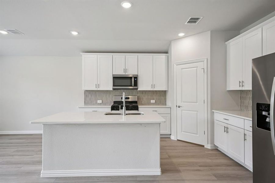 Furnished interior view inside a new home in Westmoor, Sherman (Image 7).
