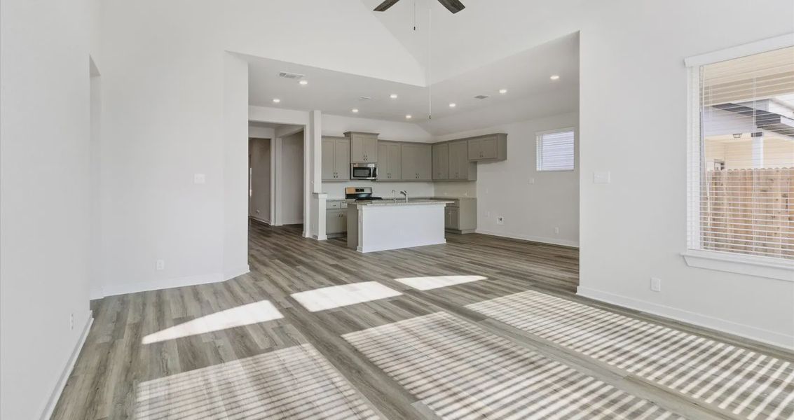 Representative unfurnished interior of a home built from the Megan by Chesmar Homes in Stream Waters, Buda (Image 11).