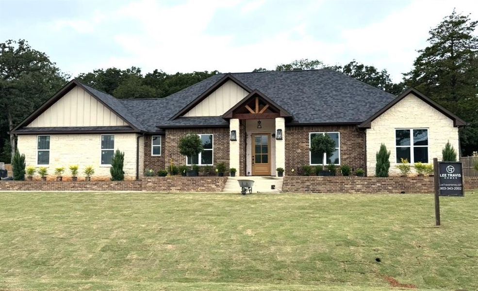 Front exterior of a new home in , Tyler, TX, highlighting curb appeal (Image 1).