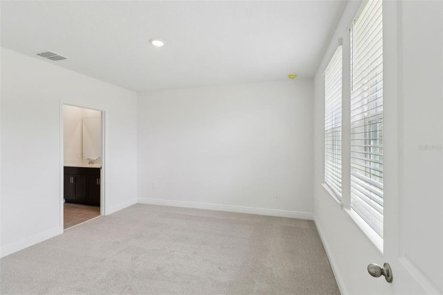 Spacious, unfurnished interior of a new home in The Reserve at Hammock Oaks - Classic Series, Lady Lake (Image 19). Spacious, unfurnished interior of a new home in The Reserve at Hammock Oaks - Classic Series, Lady Lake (Image 19).