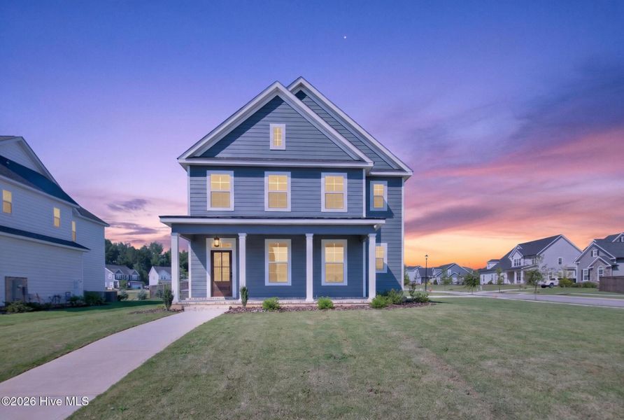 Front exterior of a new home in Highland Lakes, Evans, GA, highlighting curb appeal (Image 2). Front exterior of a new home in Highland Lakes, Evans, GA, highlighting curb appeal (Image 2).