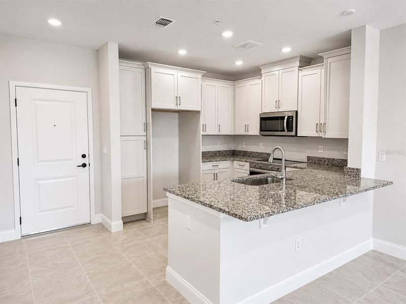 Furnished interior view inside a new home in Gatherings® of Lake Nona, Orlando (Image 8).