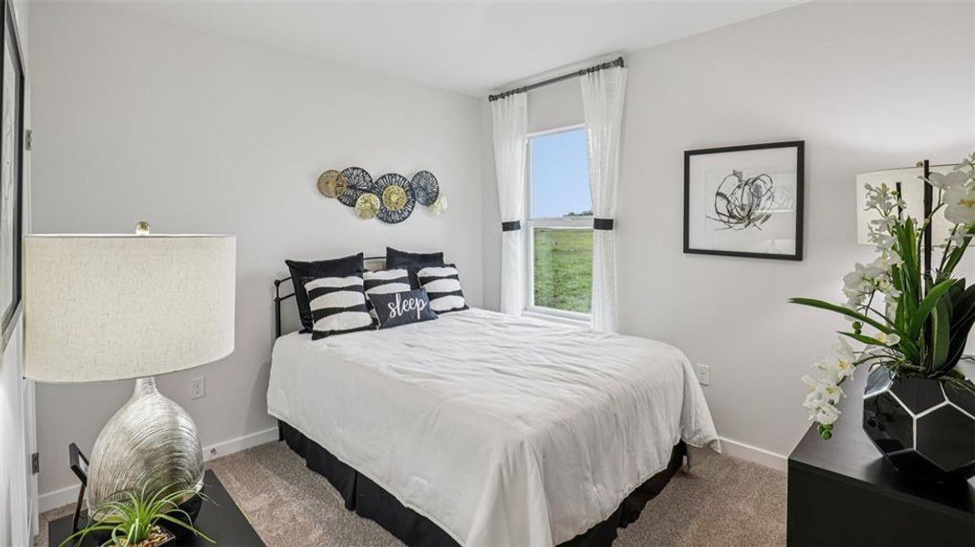 Furnished interior view inside a new home in Seagrass - Express & Tradition, Punta Gorda (Image 18). Furnished interior view inside a new home in Seagrass - Express & Tradition, Punta Gorda (Image 18).