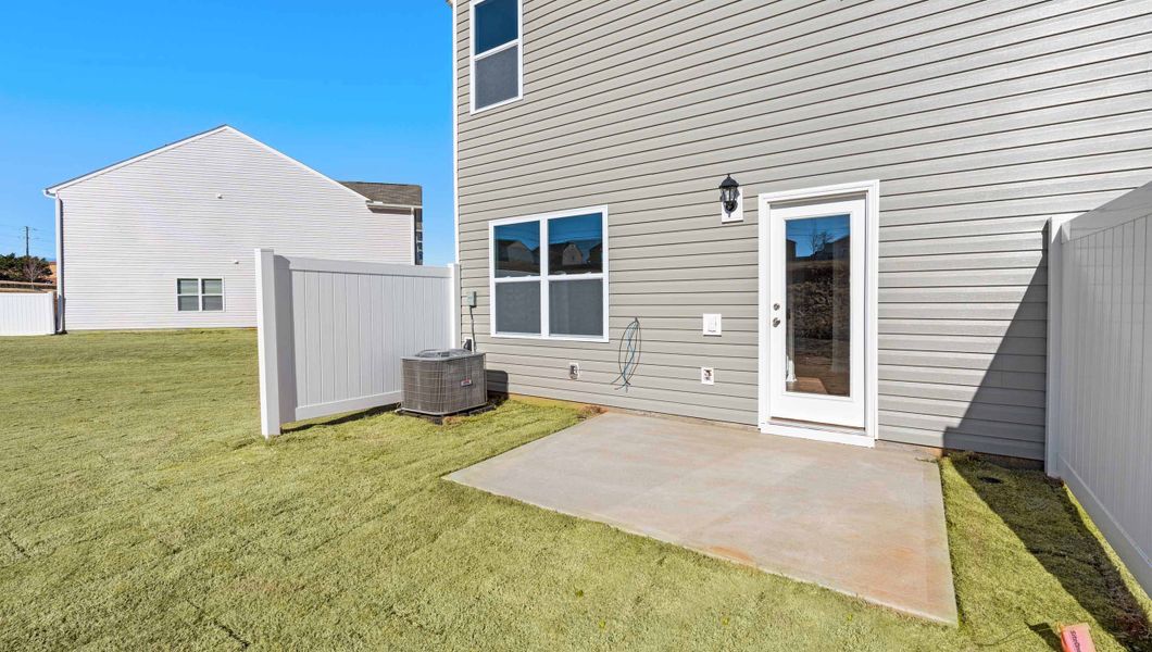 Front exterior of a new home in Tanglewood Townes, Greenville, SC, highlighting curb appeal (Image 18).