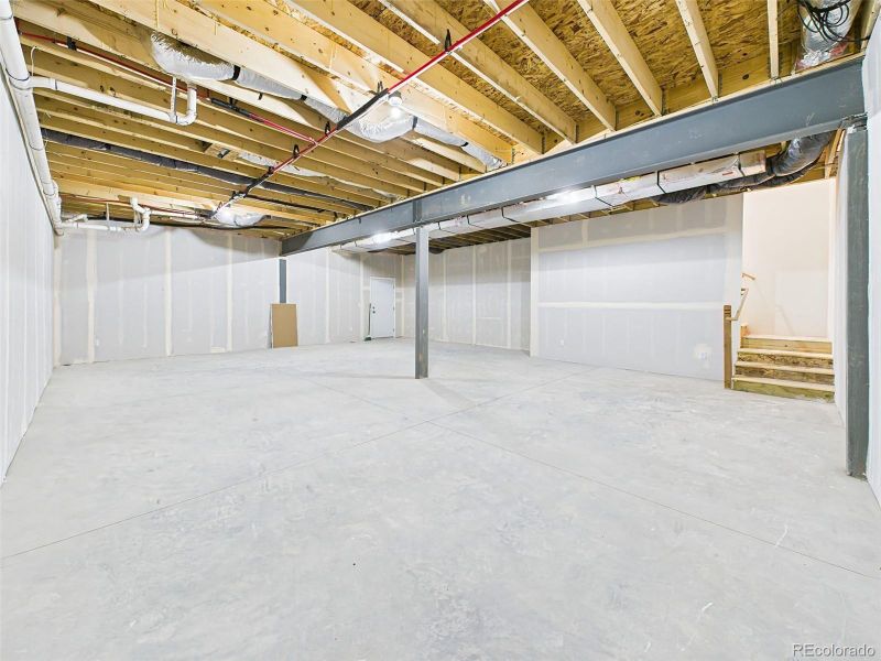 Expansive basement ready for customization—framed, insulated, and plumbed for future finishing 10' Ceiling. Expansive basement ready for customization—framed, insulated, and plumbed for future finishing 10' Ceiling.