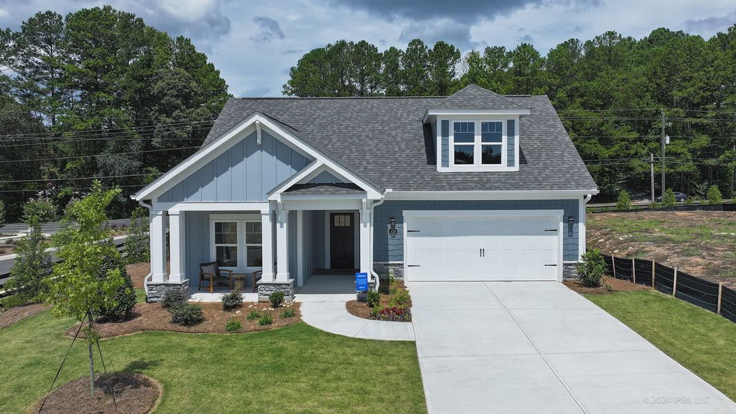 Representative exterior photo of a completed home built from the Portico by Epcon Communities in The Courtyards at Bailey Farms, Dacula, GA (Image 29).