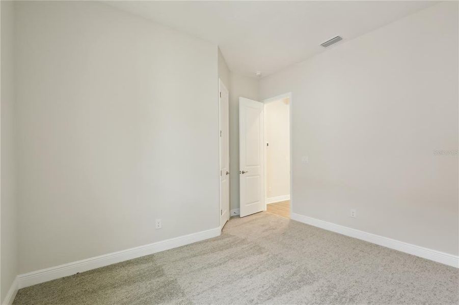 Spacious, unfurnished interior of a new home in Triple Creek, Riverview (Image 31).