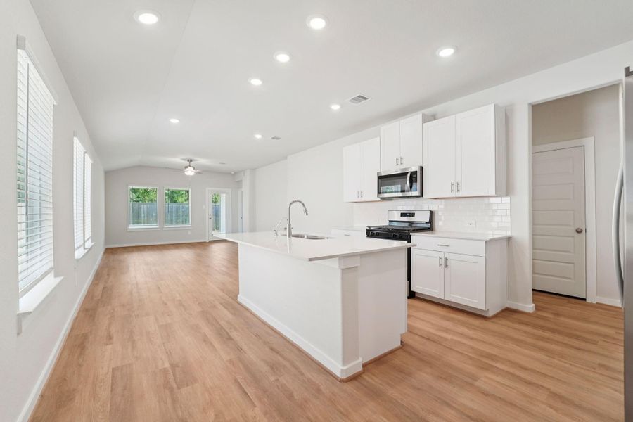 Furnished interior view inside a new home in Pine Lake Cove - Traditional Series, Montgomery (Image 14).