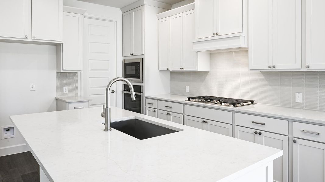 Furnished interior view inside a new home in 6 Creeks, Kyle (Image 7).