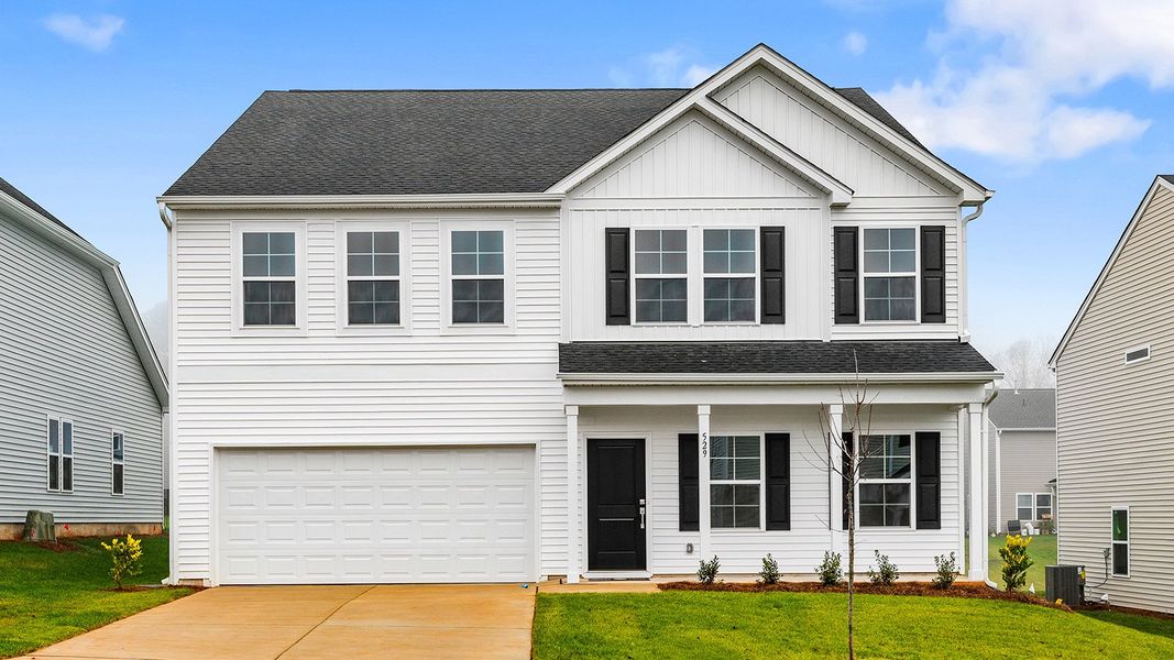 Front exterior of a new home in Hanes Lake, Winston-Salem, NC, highlighting curb appeal (Image 1).