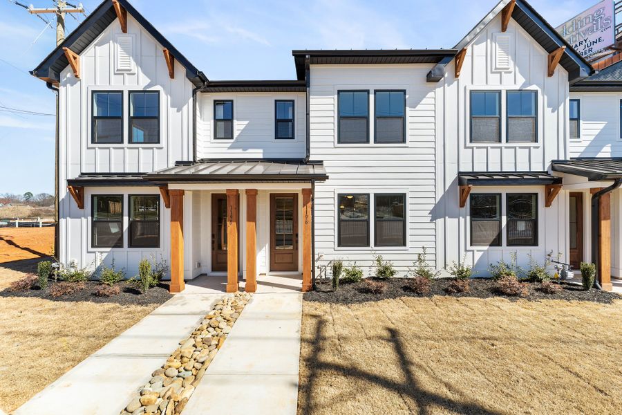 Representative exterior photo of a completed home built from the Holland by Hunter Quinn Homes in Renaissance Place, Greenville, SC (Image 1).