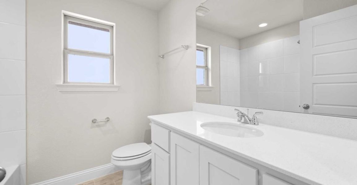 Representative exterior photo of a completed home built from the Alderbury by Impression Homes in Timberbrook, Justin, TX (Image 22).