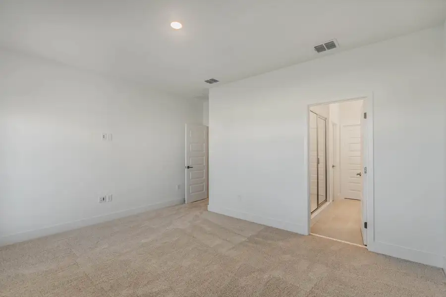 Spacious, unfurnished interior of a new home in Harvest at Ovation - Townhomes, Winter Garden (Image 24).