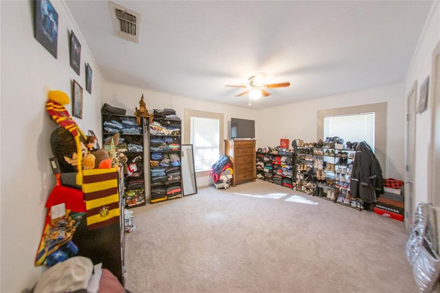 Game room featuring carpet flooring and ceiling fan