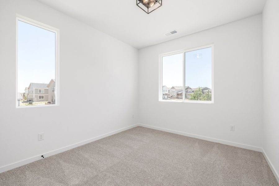Spacious, unfurnished interior of a new home in Painted Prairie, Aurora (Image 24).