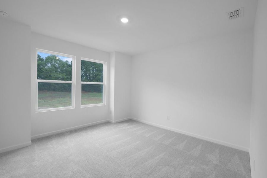 Representative unfurnished interior of a home built from the Norcross by Taylor Morrison in Windance Lake, Loganville (Image 24).