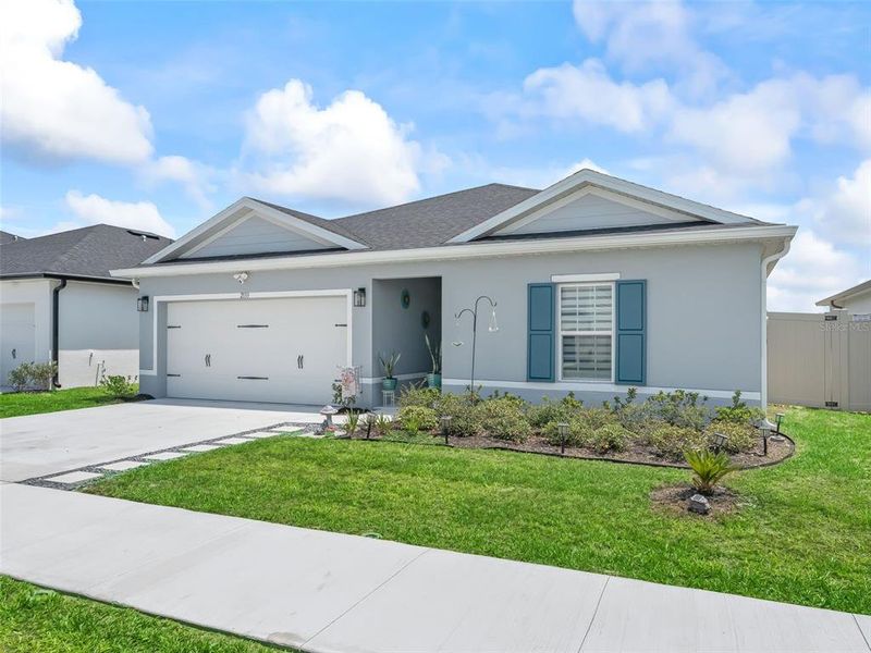Front exterior of a new home in , Sumterville, FL, highlighting curb appeal (Image 21).
