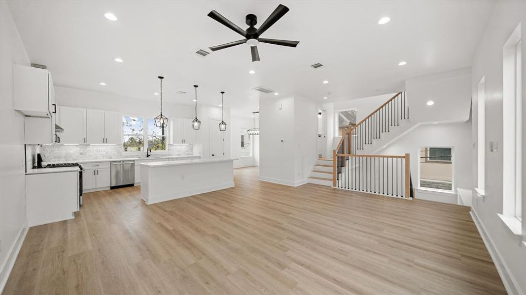 Fantastic open layout between the living, kitchen, and dining spaces.