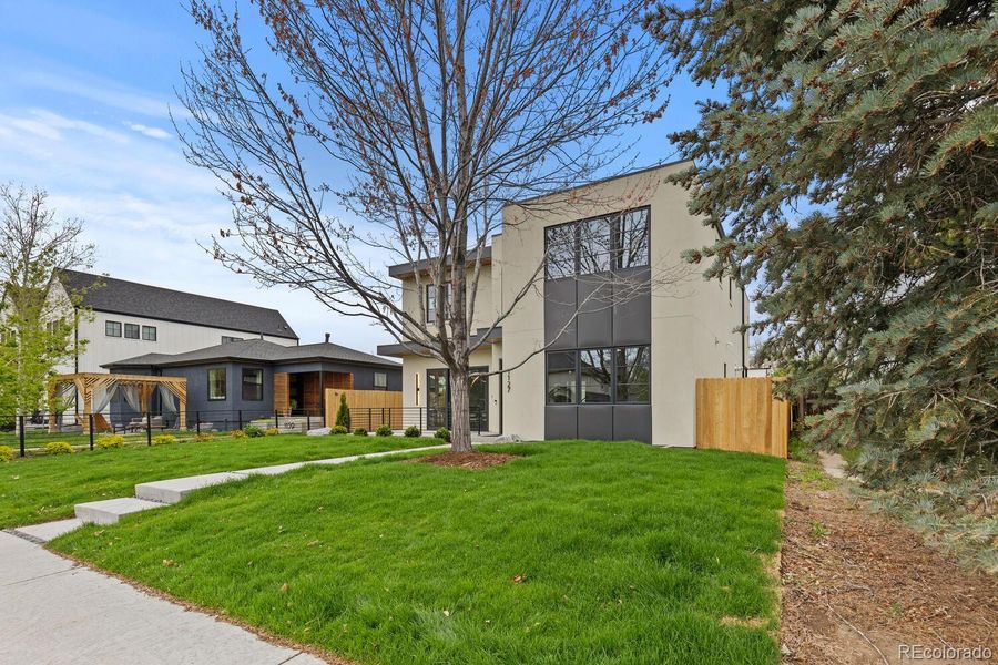 Front exterior of a new home in , Denver, CO, highlighting curb appeal (Image 23).