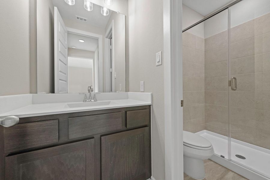 Furnished interior view inside a new home in Bridgeland, Cypress (Image 11).
