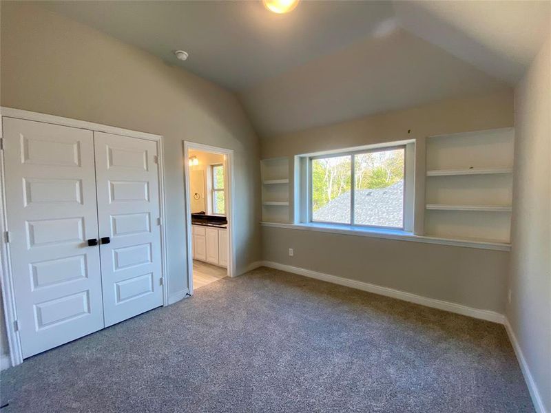 Bed 4 with vaulted ceiling and built-in shelves shares Jack & Jill Bath 4 Bed 4 with vaulted ceiling and built-in shelves shares Jack & Jill Bath 4