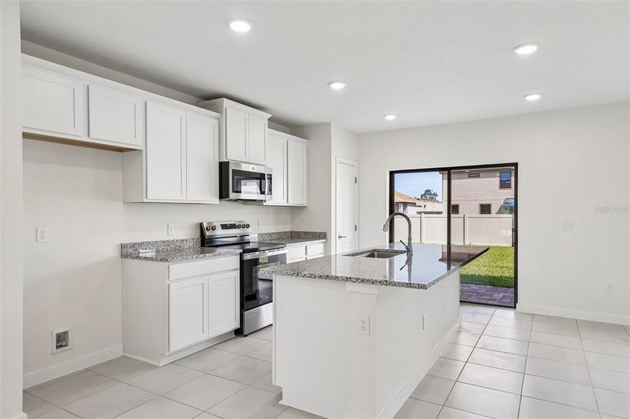 Furnished interior view inside a new home in Grasslands West, Lakeland (Image 8).