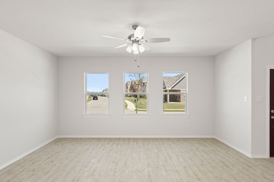Front exterior of a new home in Heartland, Crandall, TX, highlighting curb appeal (Image 17).