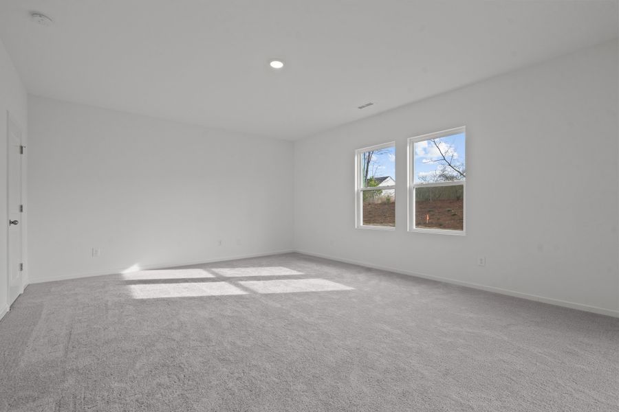 Representative unfurnished interior of a home built from the Spectra by Starlight Homes in Hawks Run, Kissimmee (Image 13).
