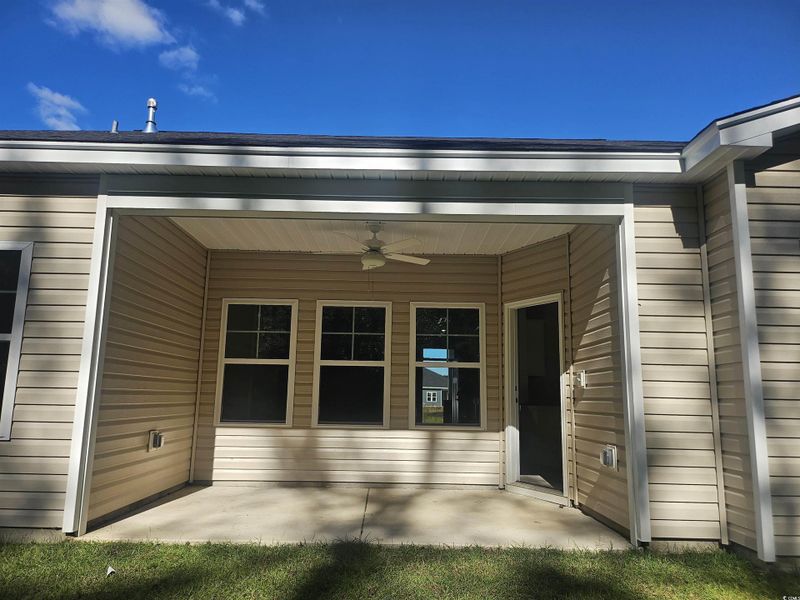 View of patio / terrace featuring a ceiling fan View of patio / terrace featuring a ceiling fan