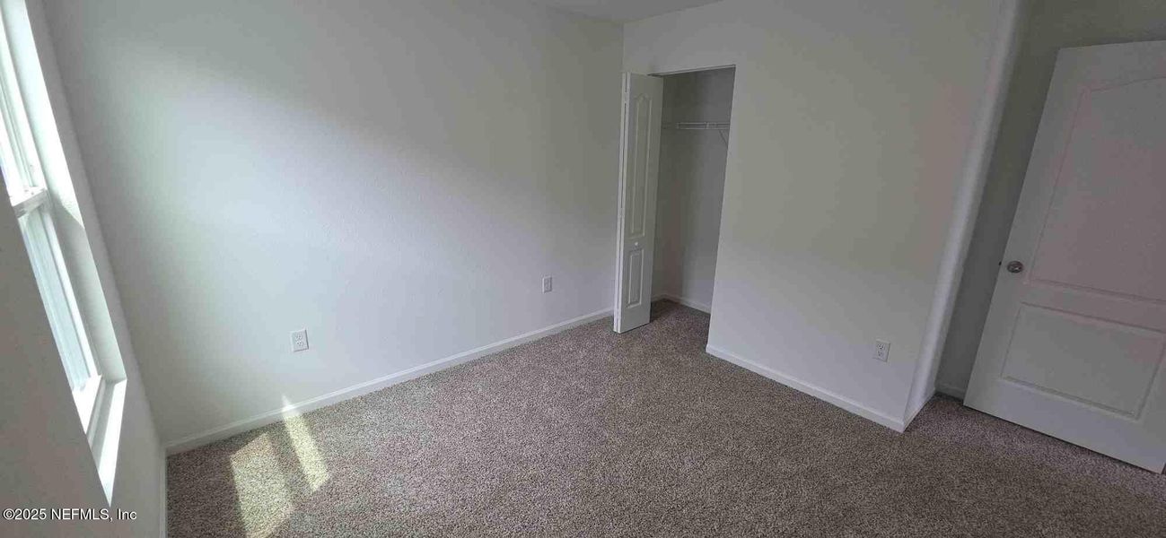 Spacious, unfurnished interior of a new home in The Arbors, Jacksonville (Image 45).