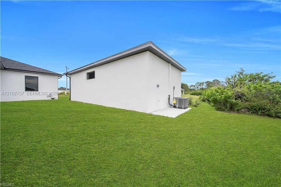 Exterior details and patio area of a home in , Lehigh Acres (Image 32).