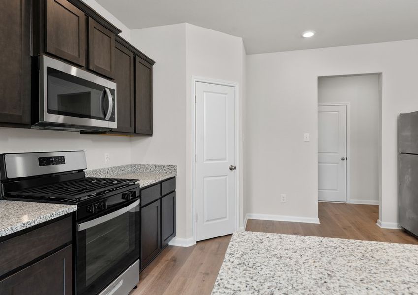 The kitchen has a large pantry that is a great place to store food and other kitchen essentials. The kitchen has a large pantry that is a great place to store food and other kitchen essentials.