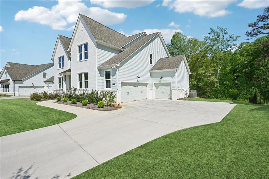 Front exterior of a new home in Fireside Farms, Dawsonville, GA, highlighting curb appeal (Image 29).
