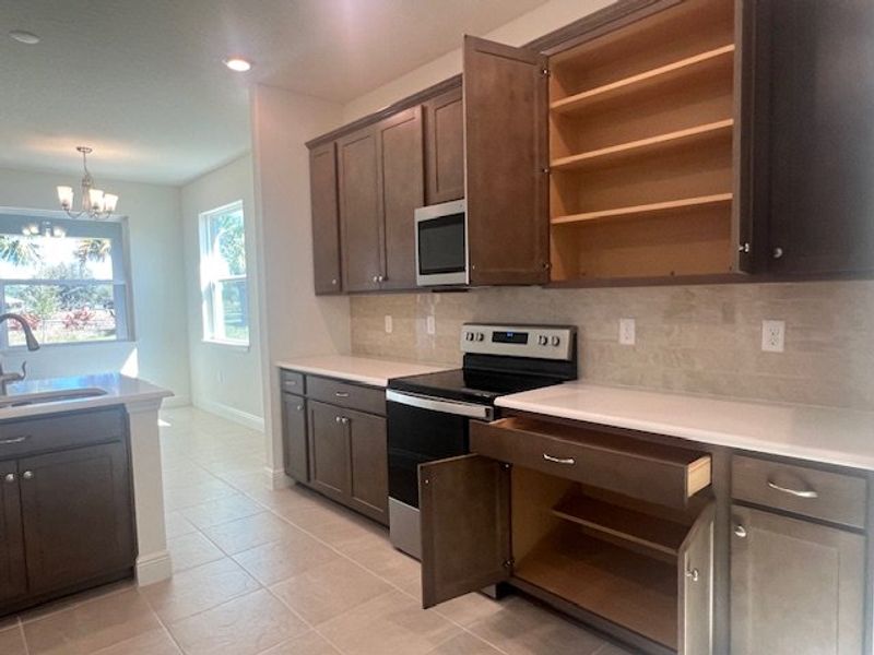 Furnished interior view inside a new home in Lakes At St Sebastian, Micco (Image 8).