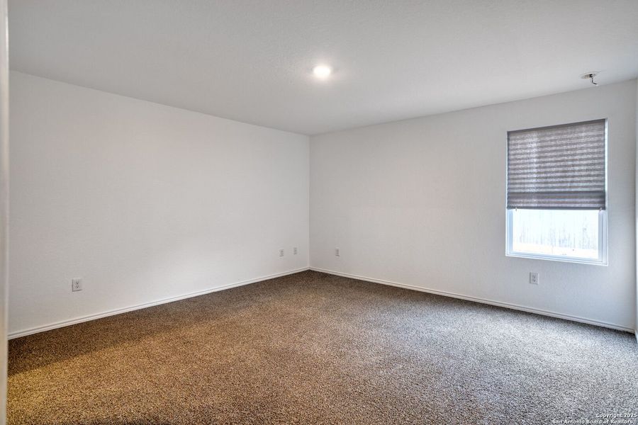 Spacious, unfurnished interior of a new home in Ruby Crossing: Cottage Collection, San Antonio (Image 9).
