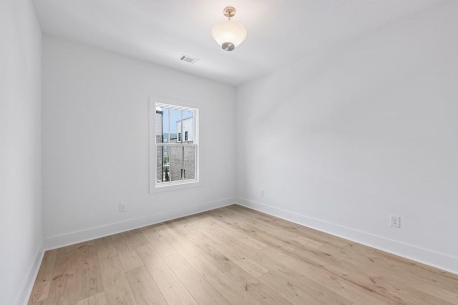 Spacious, unfurnished interior of a new home in Skyview On Broad, Sugar Hill (Image 39).