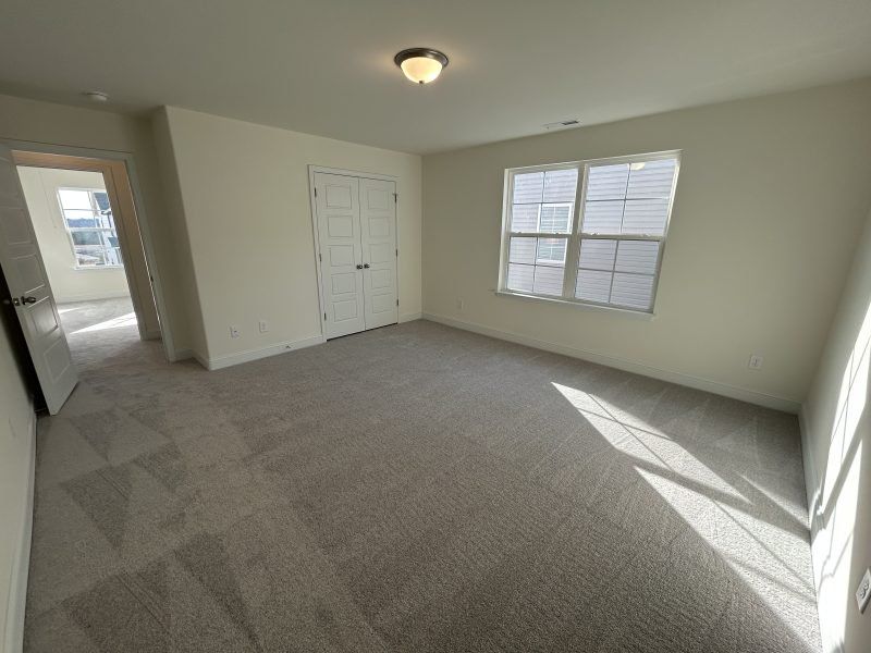 Spacious, unfurnished interior of a new home in Miller's Reserve, Winston-Salem (Image 53).