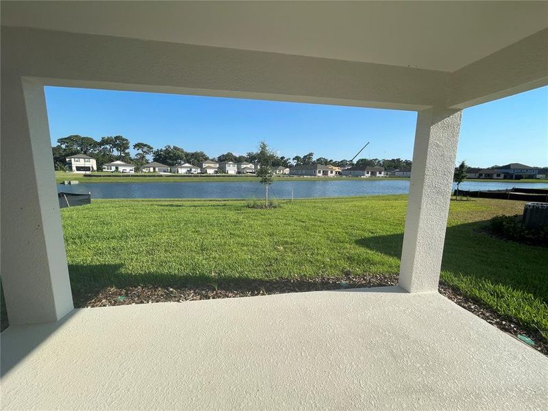 Exterior details and patio area of a home in Isles at BayView, Parrish (Image 3).